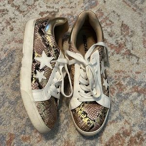 Snakeskin gold shoes